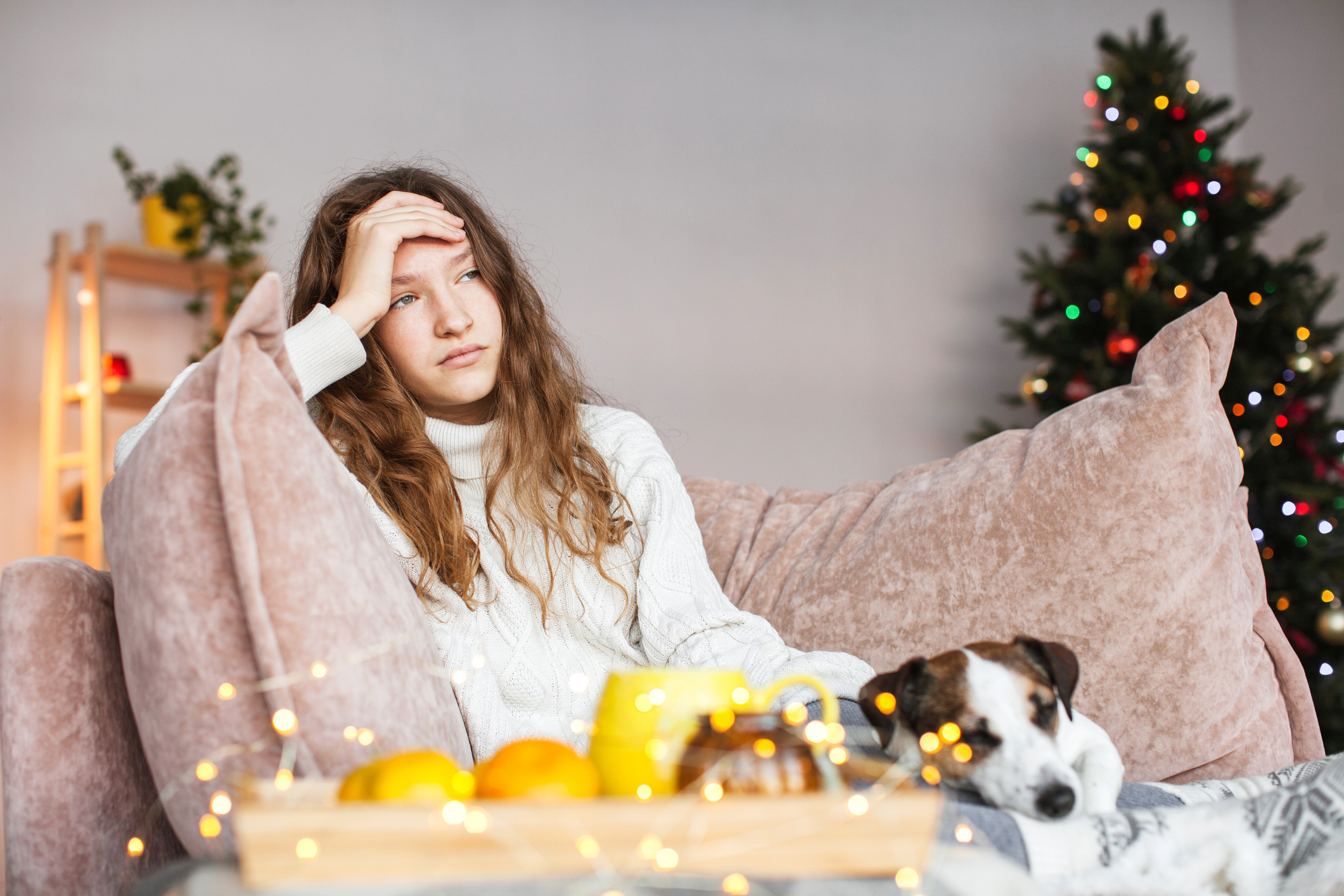 Young woman feeling alone during Christmas holiday